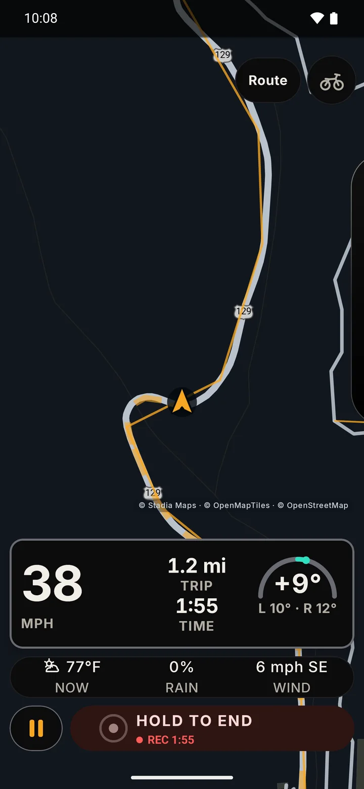 RIDE riding screen in the Dark theme on a dark map: speed 38 mph, trip 1.2 miles, ride time, a live lean reading with the left and right maximums filled in, a weather strip and Hold to end.