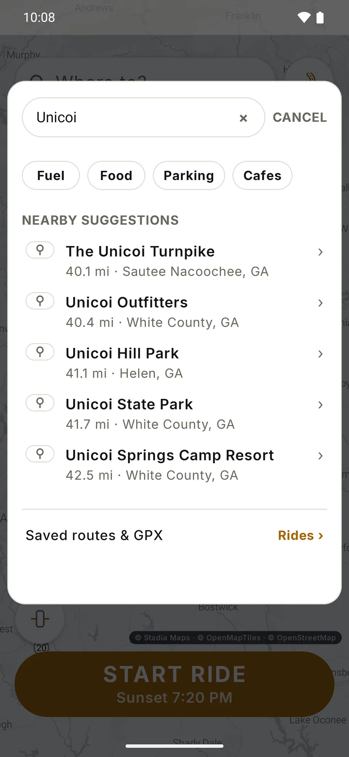 RIDE destination search sheet with a query typed in, the Fuel, Food, Parking and Cafes shortcuts, and a list of nearby suggestions with distance and area.